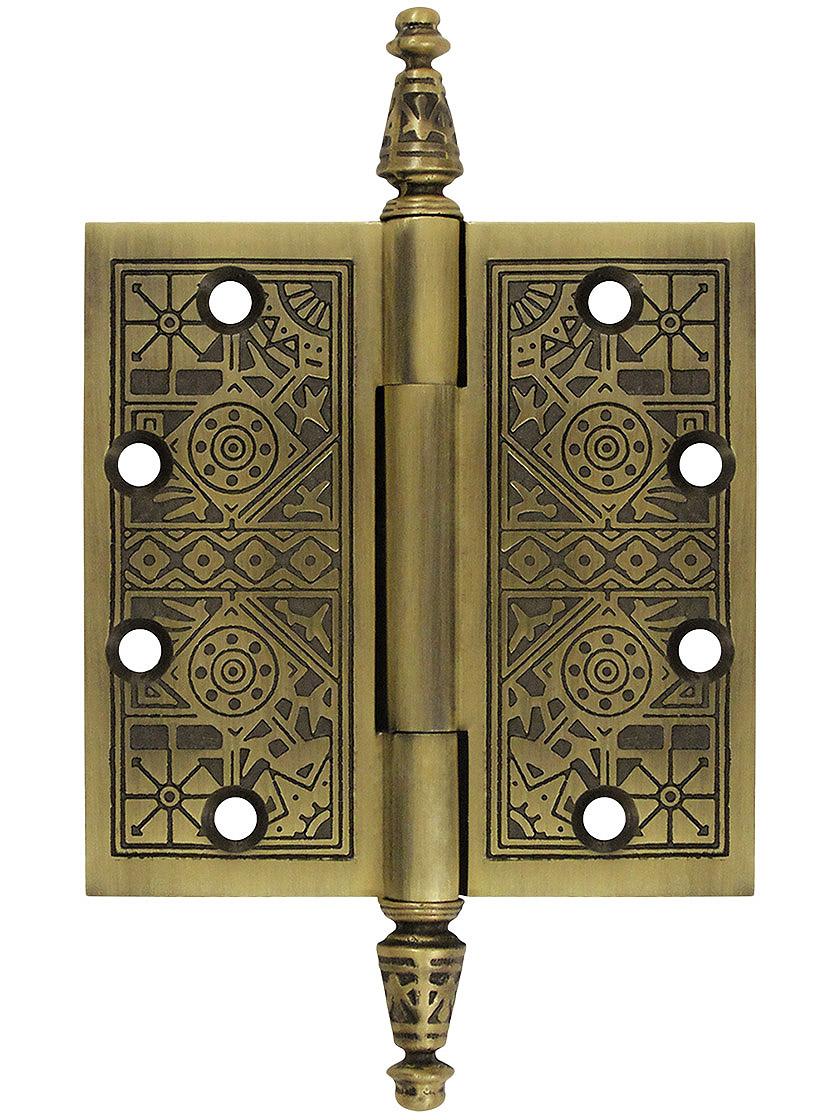 4 1/2 inch Premium Brass Aesthetic Pattern Hinge With Decorative Steeple Tips In Antique Brass